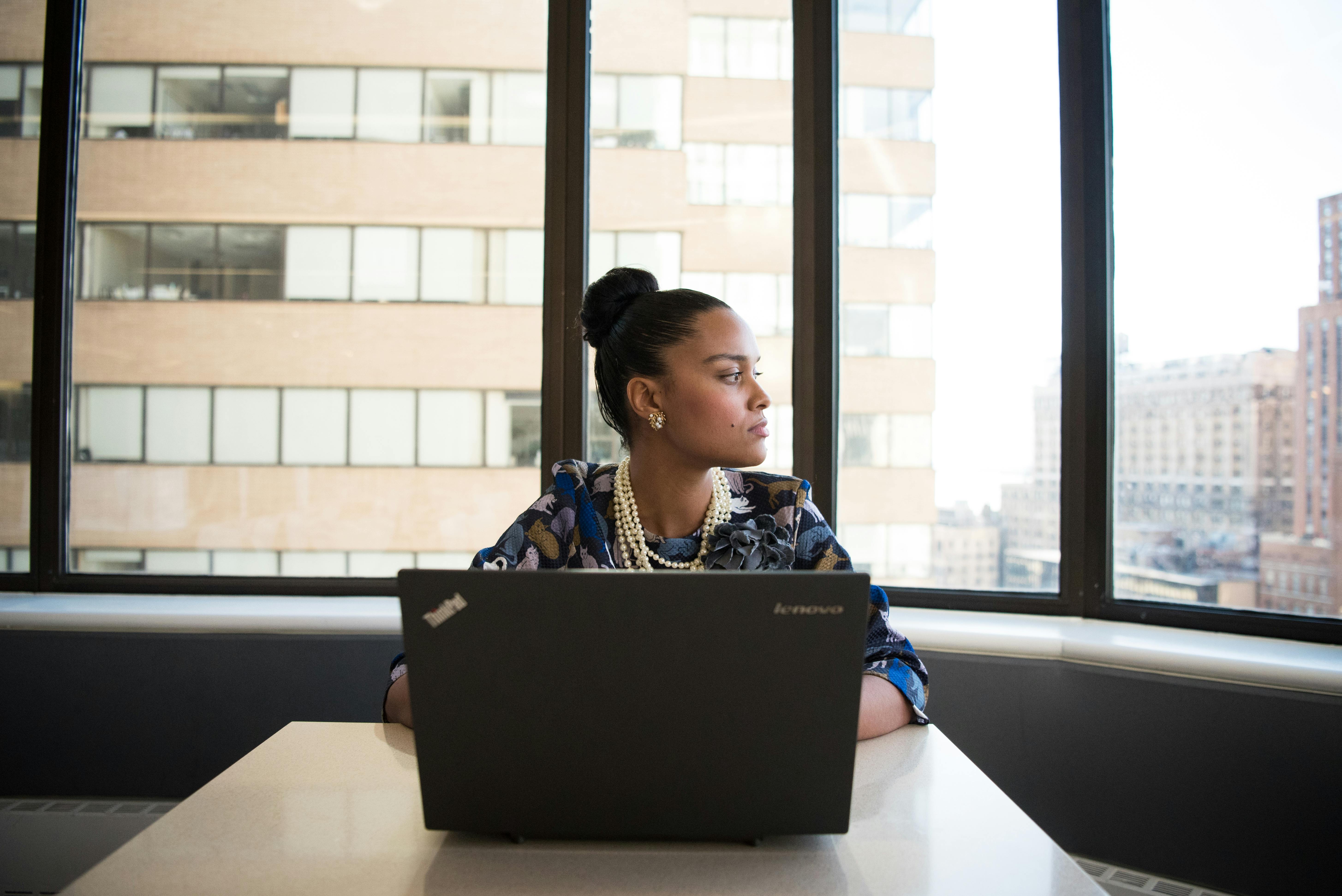 part time real estate agent working on laptop